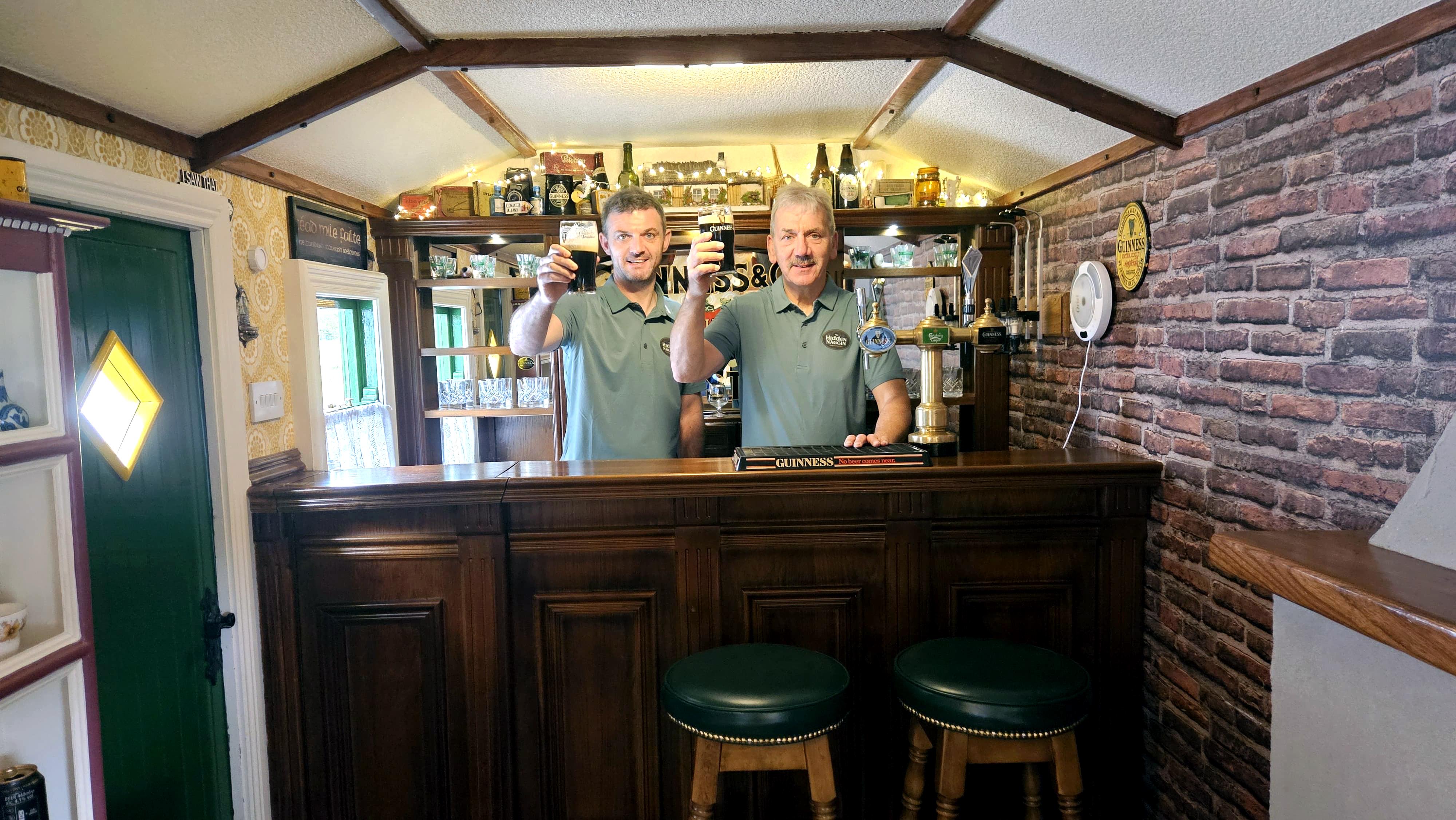 Jonny and Seamie standing beside The Hidden Naggin
