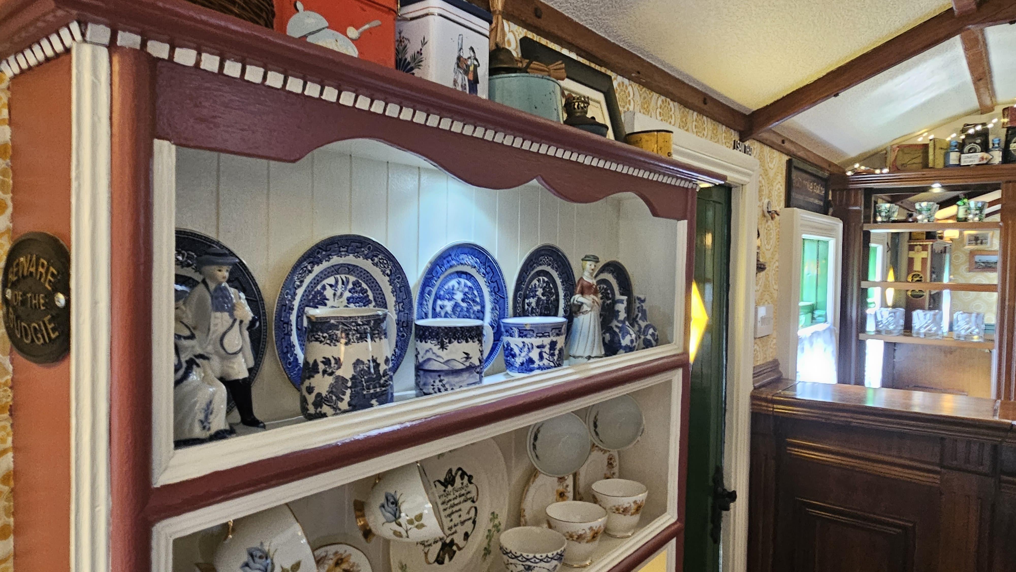 Blue china dresser detail inside The Hidden Naggin