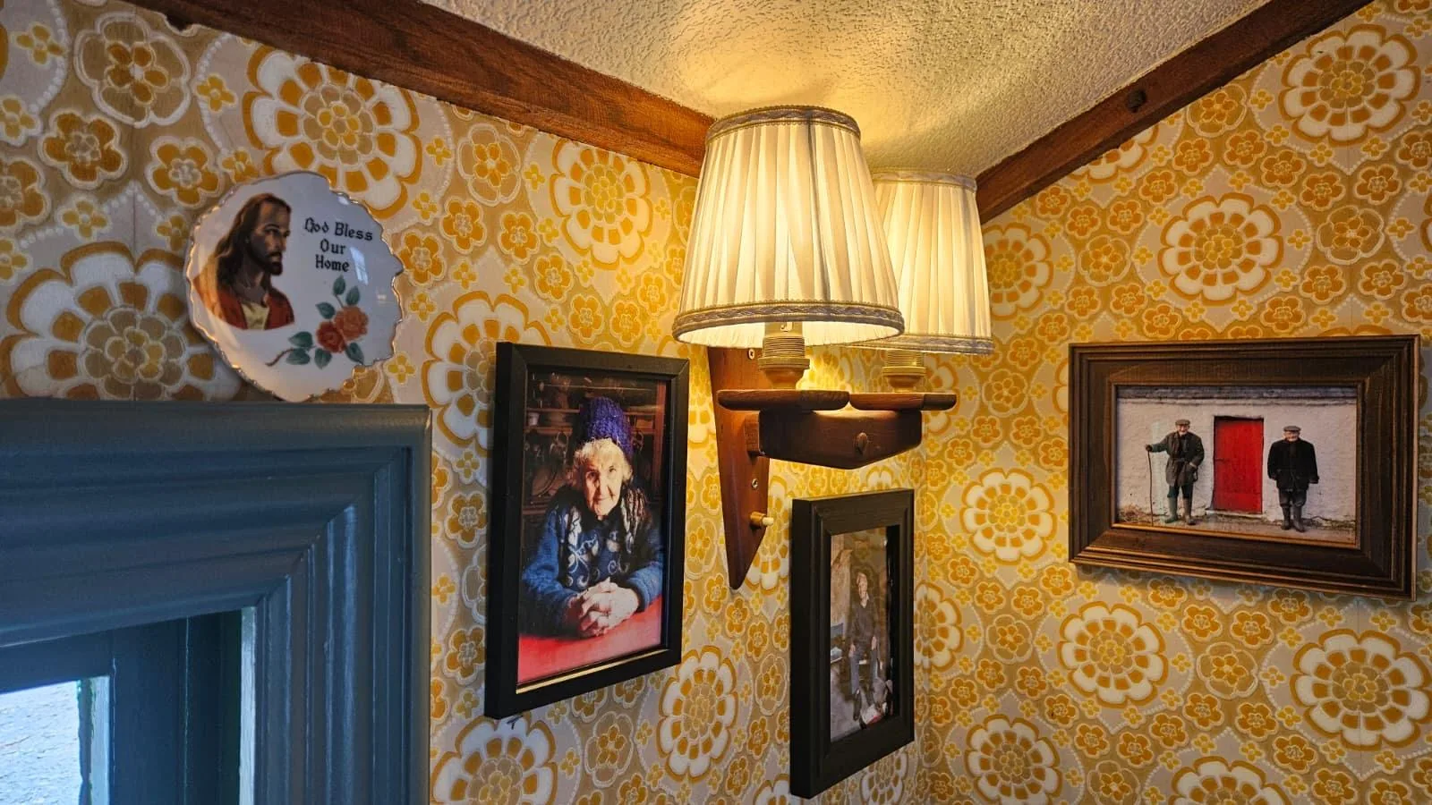 Lamps and framed photos on the interior wall