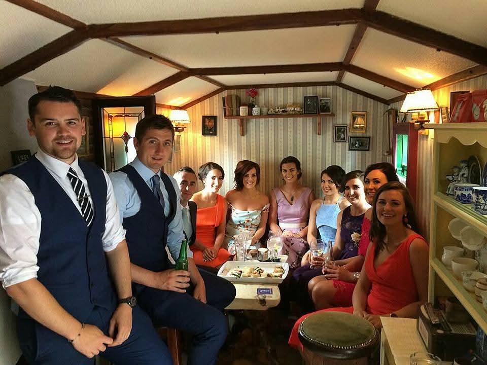 Seated party group inside The Hidden Naggin